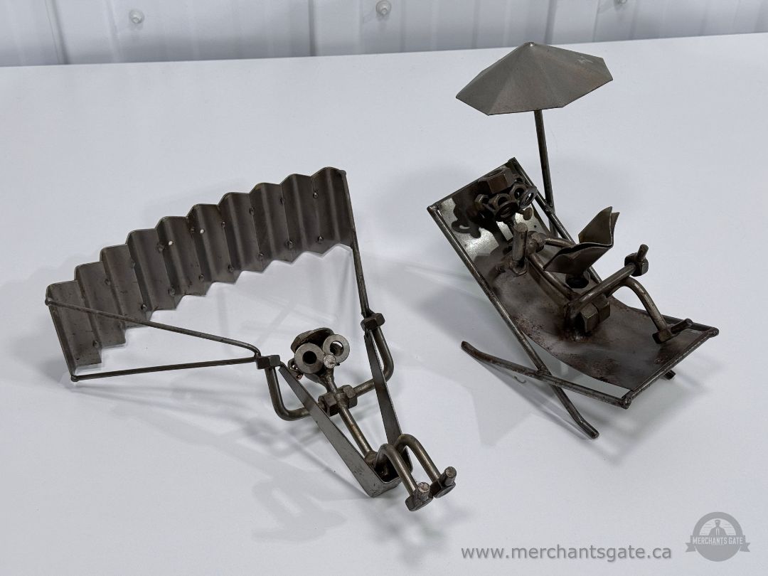 Vintage Metal Figurines Parachute and Ski Scene Welded Steel Art Sculpturessecond on lawn chair