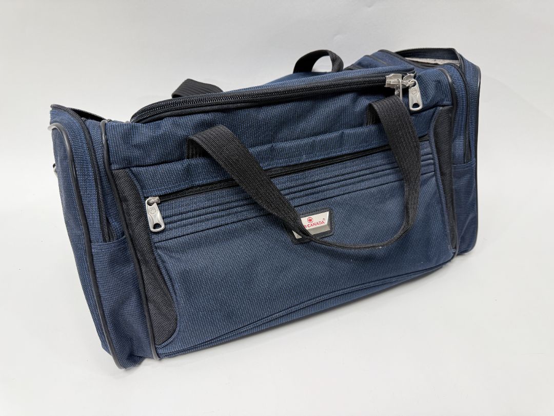Air Canada Carry On Travel Bag Blue Softside Luggage With Zippers Pockets And Shoulder Straps