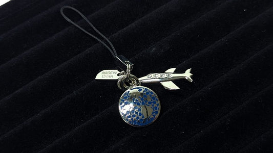 Coach Silver Tone Airplane Clear Crystals Blue Enamel Logo Earth Cellphone Charm