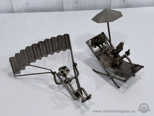 Vintage Metal Figurines Parachute and Ski Scene Welded Steel Art Sculpturessecond on lawn chair