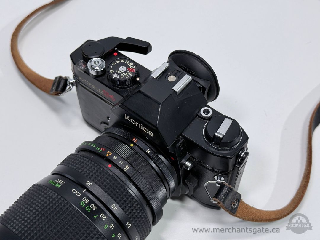 Konica Autoreflex T4 35mm SLR Film Camera with Vivitar 70 210mm Lens Strap