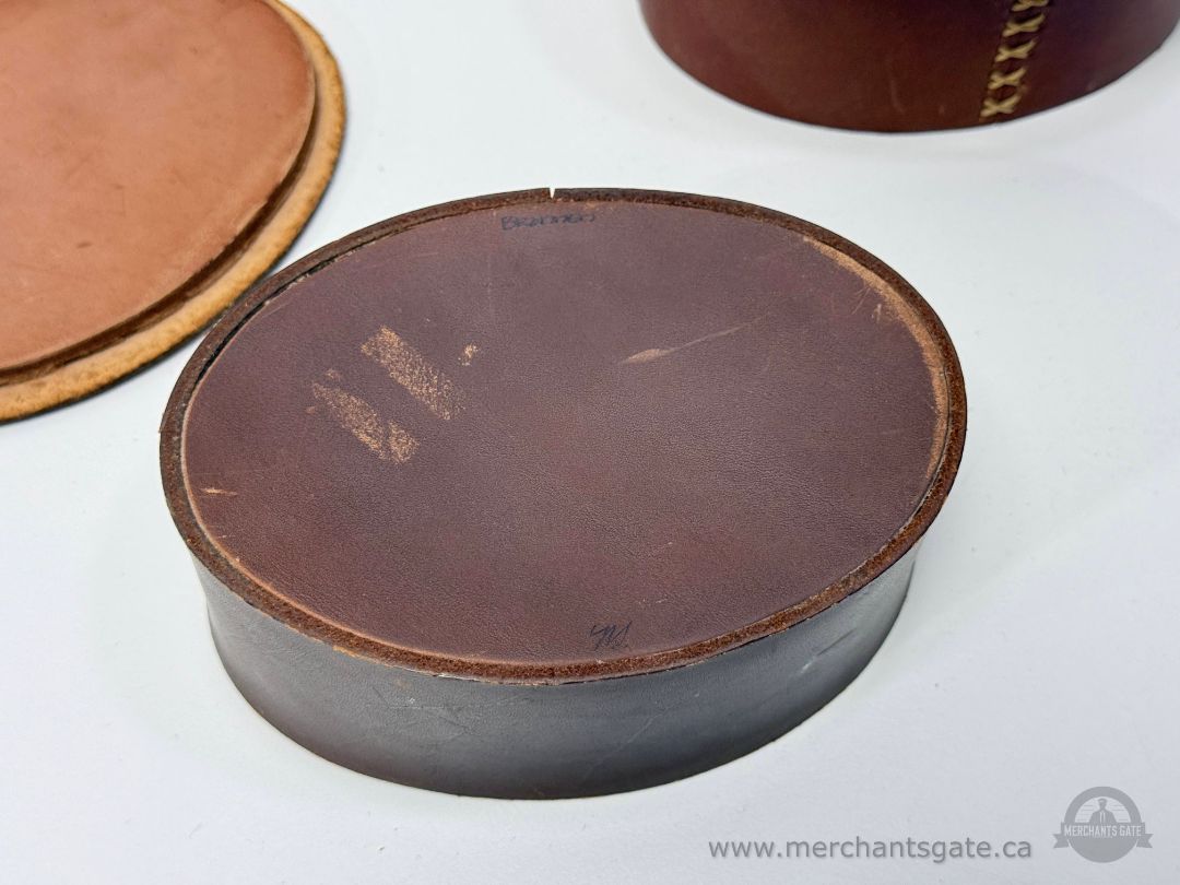 Two Handmade Round Leather Boxes with Bird Motif Signed Brannen