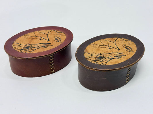 Two Handmade Round Leather Boxes with Bird Motif Signed Brannen